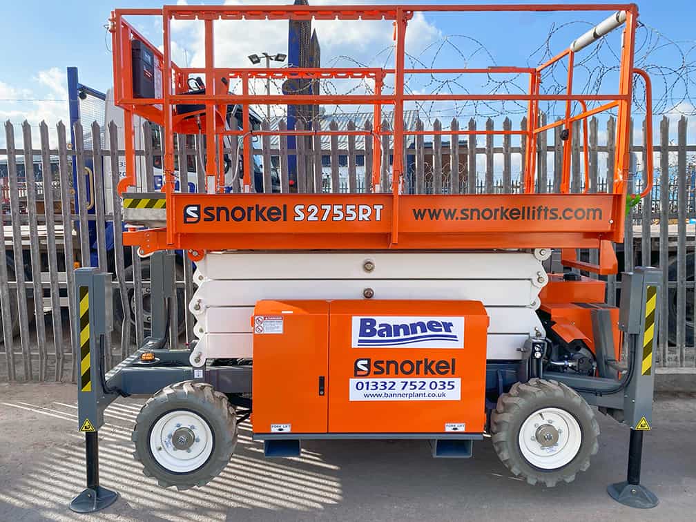A Snorkel S2755RT narrow rough terrain scissor lift ready to hire
